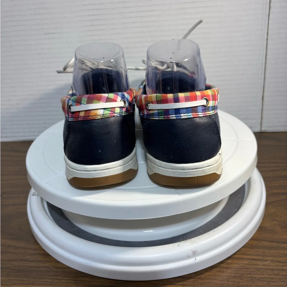 Falls Creek women’s 11 boat or deck shoes. Leather laces navy w/red & white trim